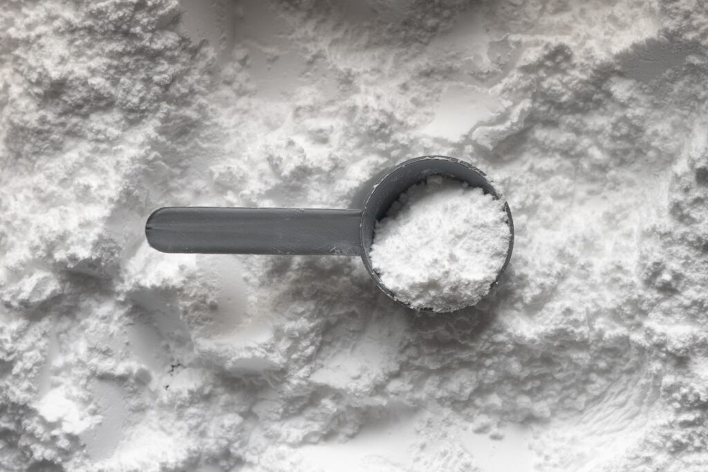 A scoop of creatine supplements