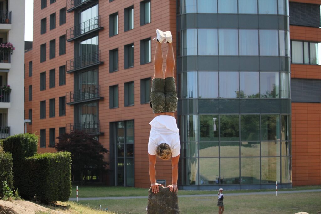 Handstand Push Ups, an advanced calisthenics skill.